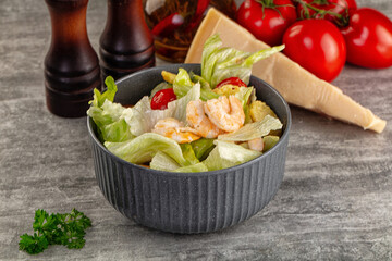 Tasty caesar salad with prawn