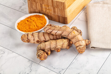 Fresh aroma tumeric roots heap