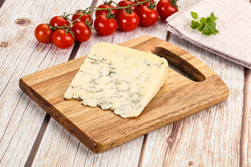 Blue cheese with mold over board
