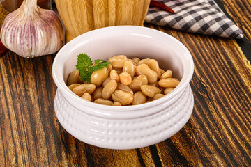 Baked white canned beans in the bowl