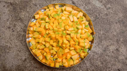 Chopped pumpkin vegetable served on a steel plate