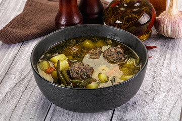 Soup with beef meatballs and vegetables