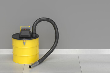 Yellow ash vacuum cleaner on tiled floor in a room
