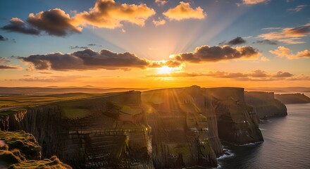 Dramatic sunset over rugged coastal cliffs