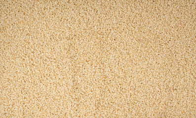 Sesame seeds pile textured background