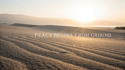 A serene desert landscape with a warm morning light spreading across the sand