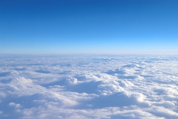 Naklejka premium Blue sky viewing vast cloud blanket from above