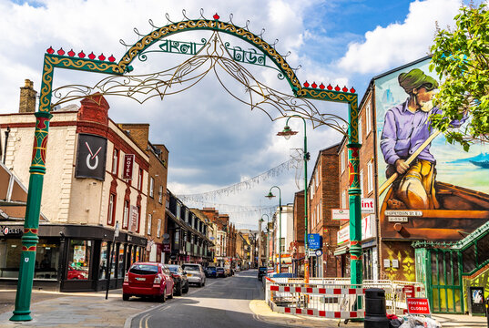 Entrance arch to Little Bangladesh with Banglatown sign in Bengali script, marking the vibrant Bangladeshi community in Brick Lane, East London, England, UK