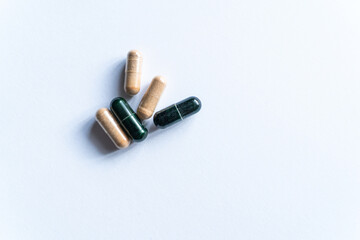 Pills on white background