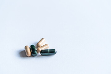 Pills on white background