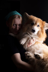 girl and dog corgi