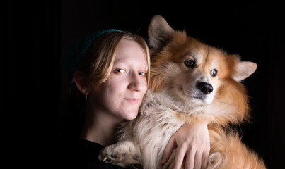 girl and dog corgi