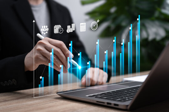 Business Growth Concept, Businesswoman Using Tablet to Compare Business and Financial Growth Charts, Forecasting Next-Year Market and Investment Performance to Achieve Target Goals and Cost Reduction