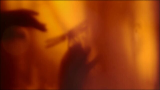 Shadow of dancing woman, hand and shadow of dragonfly in glowing blurred light. Her carefree demeanor embodies freedom and happiness. Moment of the silence. Cinematic effect. Sustainable lifestyle