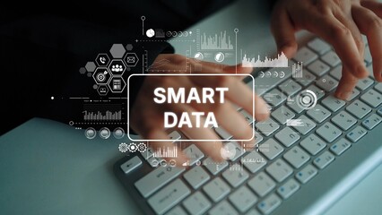 Hands Typing on Keyboard with Smart Data Concept and Graphical Elements Displayed over Image. Asymptotic smart data analytic.