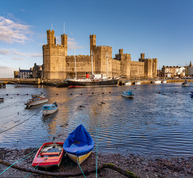 Caernarfon castle at high tide in the winter morning