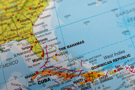 Warsaw, Poland - Dec 5, 2025: Close-up view of a detailed map highlighting Florida and The Bahamas, illustrating vibrant coastline and tourist destinations, emphasizing travel spots.