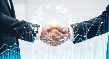 Close-up of a handshake between two people in dark suits, overlaid with a digital global network and graph display for business success and agreement