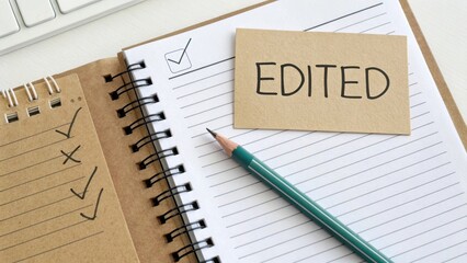 Notepad with edit card pencil and margin correction details