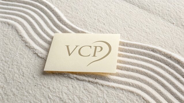 Offwhite VCP note resting on textured sand