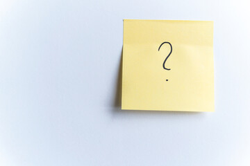 Yellow sticky note with question mark