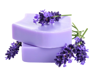 Stacked, purple soap bars adorned with delicate lavender sprigs against a dark background, evoking calm & cleanliness