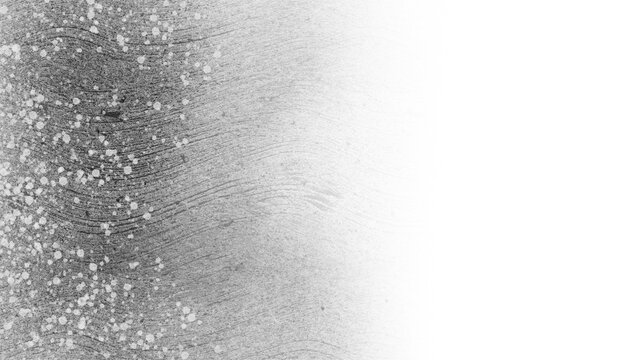 Gray paint brush strokes and texture with white splatter on transparent background. White paint splatters and dots. Gradient transition from dark charcoal gray to light gray. PNG