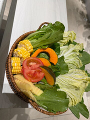 Fresh mixed vegetables in a basket for cooking