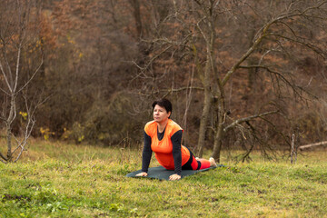 Woman performing yoga stretching