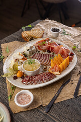 Deluxe charcuterie board showcasing gourmet meats