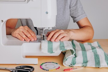 Creating Handmade Textiles: A Close-Up on Sewing Techniques with a Machine, Fabric, and Essential Accessories for Perfect Results