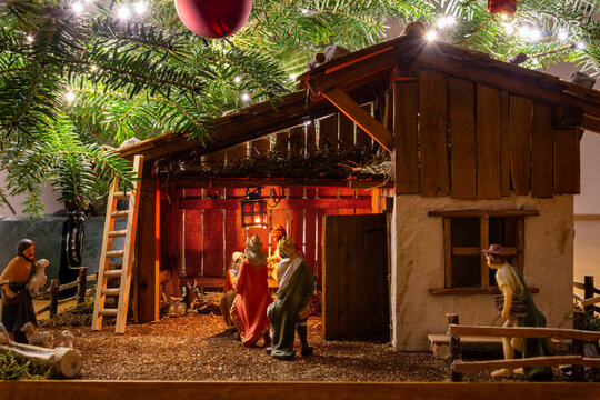 Close-up of nativity scene with kings and lamp