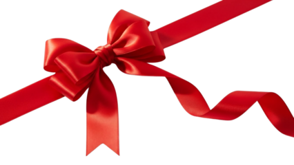 Close up of a vibrant red satin ribbon tied into a bow on a dark background, angled view
