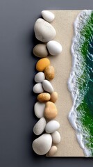 Pebbles Arranged on Sand with Ocean View