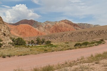 View of colorful mountains in Kekemeren river canyon. Naryn region. Kyrgyzstan. Asia.
