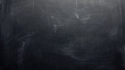 A classic, textured chalkboard surface with subtle white chalk dust streaks, perfect for educational or creative backgrounds