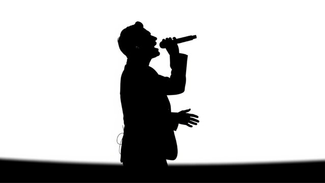 Silhouette of Singer Holding Microphone and Singing on Stage, Side View, Black on White Background