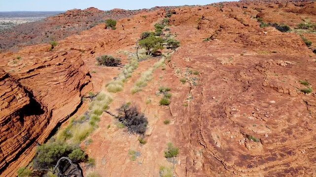 Flying over rock formations in the Kings Canyon in Australia