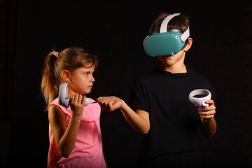 Siblings Interacting with Virtual Reality Headset and Controllers Indoors - gaming, VR experiences, digital childhood, and home entertainment