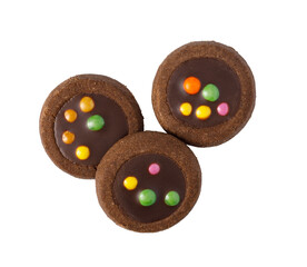 Chocolate cookies with colorful candy sprinkles top view