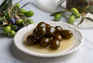 Green fresh olive jam. Food concept photo.