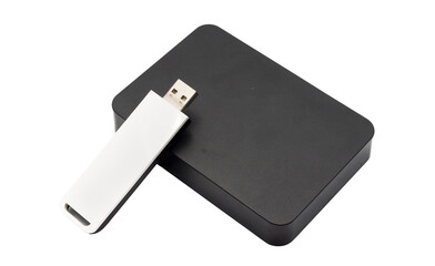Portable digital storage solutions, including a sleek USB flash drive and an external data hard disk, essential for modern computing