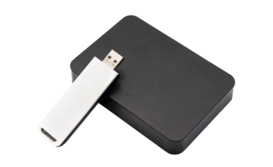 Portable digital storage solutions, including a sleek USB flash drive and an external data hard disk, essential for modern computing