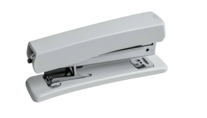 A white, office-style stapler, with a metal and plastic design, isolated on black background