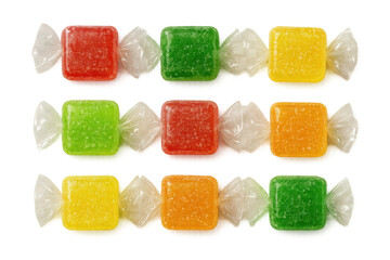 Colorful square candies in clear wrappers, offering sweet treat variety with a transparent background