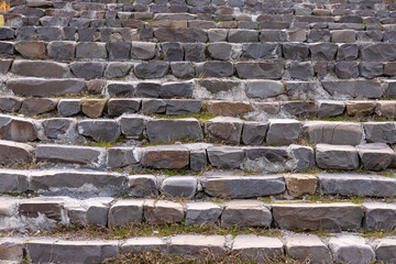 Ancient cobblestone steps leading up.
