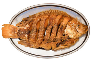 Crispy fried ruby fish served on a stainless-steel plate, isolated on transparent background.