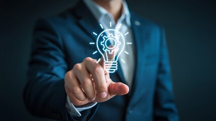 Businessman touching a glowing light bulb icon symbolizing innovation creativity and new ideas for business growth and development
