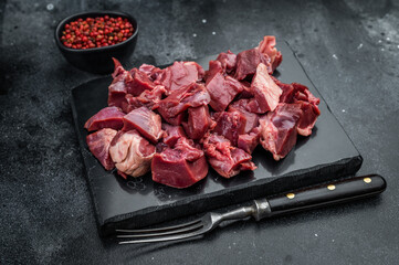 Raw diced veal and lamb heart for cooking, great for rustic meals, aromatic broths and nutrient rich organ meat recipes.