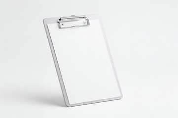 Clear transparent clipboard with silver clip on white background